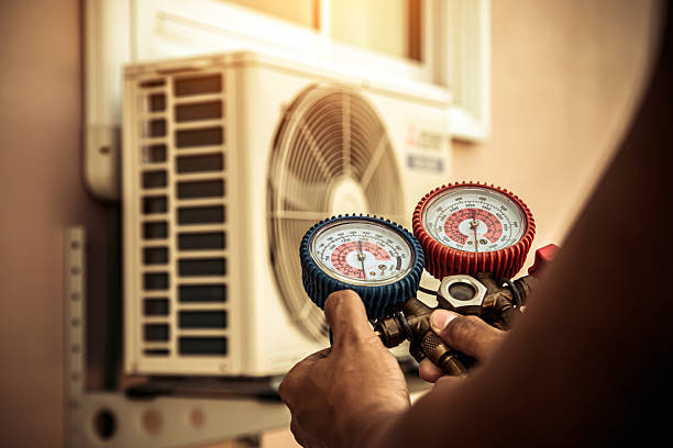 Professional Air Conditioning Service technician working in Ridgeway, VA